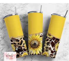 three yellow sunflowers with leopard spots on them are shown next to each other