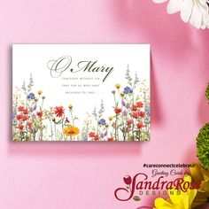 a pink background with flowers and greeting cards