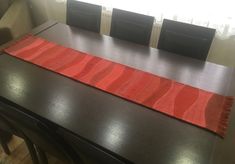 "Red textured woolen table runner made of handwoven farbic framents in various tones of red. Ends are with short fringes and back is covered with dark brown canvas-like fabric. Size: 11\" x 60\" / 28 x 154 cm  I try our best to capture colors as close as possible. Nevertheless, actual colors may slightly vary due to nature of photography and screens settings.  Dry cleaning recommended. Please feel free to contact to order table runners in a custom length or any other questions. Please visit my shop to see more of my unique items: https://www.etsy.com/shop/YumakCrafts" Short Fringe, Red Table, Brown Canvas, Linen Table Runner, Decorating Coffee Tables, Table Covers, Decoration Table, Dining Linens, Table Runners