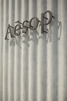 the word aessop is etched in metal