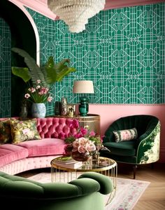 a living room with green and pink furniture