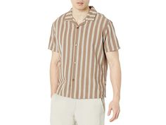 Rhythm Vacation Stripe Short Sleeve Shirt - Men's Clothing : Latte : Get a crisp and clean look and enjoy premium comfort throughout the day by opting for the Rhythm Vacation Stripe Short Sleeve Shirt. Notched Cuban style collar and short sleeves. Buttoned front closure. Allover striped pattern. Straight hem. 65% cotton, 35% linen. Machine wash cold. Imported. Measurements: Length: 27 in Product measurements were taken using size MD. Please note that measurements may vary by size. Summer Camp Collar Tops With Striped Collar, Summer Tops With Striped Camp Collar, Spring Striped Short Sleeve Shirt With Camp Collar, Striped Short Sleeve Shirt With Camp Collar For Spring, Summer Shirt With Striped Camp Collar, Spring Cotton Short Sleeve Shirt With Vertical Stripes, Cotton Short Sleeve Shirt With Vertical Stripes For Spring, Beige Tops With Vertical Stripes For Summer, Beach Tops With Striped Collar And Short Sleeves