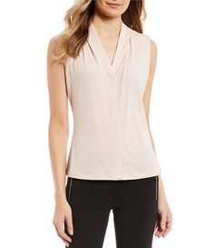 From Calvin Klein&#x2C; this top features:matte jersey fabricationv-neckline with center pleat designsleeveless with shoulder pleating detailshigh low hemlinepullover constructionapprox. 24" lengthpolyester/spandexdry cleanImported. Tops And Blouses, Jersey Top, Dillard's, Latest Fashion For Women, Women's Tops, Womens Clothing Tops, Stylish Outfits, Fashion Clothes Women, Top Styles