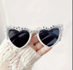 These fun sunglasses are great to celebrate any occasion! These personalized sunglasses are great for milestone birthdays, photo shoots and birthday parties. Just let me know what coloring you would like for your beads. The mix of flat back pearls and rhinestones gives it so much sparkle and something extra to celebrate your event. Just let us know what color you would like and we will do a mix of pearls and rhinestones in that shade. Elegant Summer Wedding Sunglasses, Elegant White Sunglasses For Wedding, Elegant White Wedding Sunglasses, Elegant Valentine's Day Party Sunglasses, Bridal Sunglasses, Pearl Glasses, Bridesmaid Glasses, Fun Sunglasses, Wedding Sunglasses