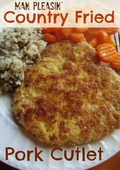 a white plate topped with meat, rice and carrots