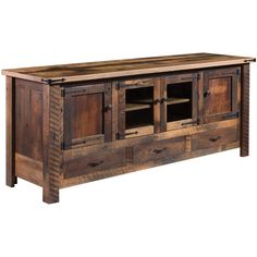 a large wooden entertainment center with drawers