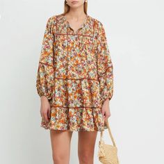 Kourt Kourtney Tunic Floral Mini Dress New With Tags / Sold Out Of Stores / Retail: $169 This Easy Breezy Dress Is Done With A Flowy Fit And Fun Fall Floral Print. Finished With Tassled Ties At The Neck For A Chic Detail. Perfect For Fall !!! Floral Multicolor Color: Autumn Marigold Mix Long Balloon Sleeves Loose Comfortable Fit Front Tassel Tie 100% Polyester Unlined Looks & Feels Like Silk Material: 100% Polyester Approx. Measurements: Length 33.1” / Bust 41”/ Sleeve 22.4” / Uk 6 # Anthropolog Mustard Floral Print Mini Dress, Mustard Floral Mini Dress, Yellow Floral Print Fall Dresses, Yellow Floral Print Dress For Fall, Yellow Floral Print Dresses For Fall, Fall Floral Print Yellow Dress, Mustard Mini Dress For Spring, Mustard Long Sleeve Dress For Brunch, Yellow Mini Dress For Fall Vacation