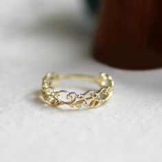 One piece of beautiful Leafy pattern designed 9K SOLID Yellow gold stacking Band Ring✨Metal: 9K Solid yellow gold✨Stamp: 9KYou might like other similar Ring from our store👇 https://etsy.me/2MyjnPw❤️Follow us on Instagram @ elekalonjewelry for latest projects and designs.*If you have any questions, please feel free to message us. Gold Stackable Rings With Intricate Design For Weddings, Wedding Stackable Rings With Intricate Design In Gold, Wedding Gold Stackable Rings With Intricate Design, Gold Engraved Ring With Intricate Design For Promise, Gold Stackable Flower Ring, Delicate Rings With Intricate Design, Heirloom Gold Stackable Rings For Marriage, Gold Heirloom Stackable Marriage Rings, Heirloom Gold Stackable Marriage Rings