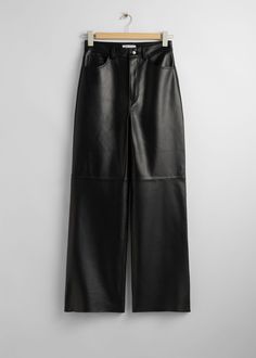 Leather trousers with a jeans-inspired, 5-pocket finish and a slim, straight leg. • Duo front pockets • Small coin pockets • Duo back pockets • Top-stitched detailing • Belt loops Length of inseam: 78.5cm / 30.9" (EU 36 / UK 8 / US 4) Preppy School Fits, Satin Wrap Skirt, Wrap Shirt Dress, Wool Knitted Dress, Leather Boots Heels, Leather Heels Sandals, Party Skirt, Flare Trousers, Leather Trousers