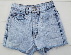 This is the actual pair of shorts you will receive  ! No Mysteries or Unwanted surprises and always  Ready to ship Vintage 80's Jordache cut off denim shorts .  Light was acid washed style. Cut off with frayed edges and zipper   fly.   so cute.  Please be sure to use the measurements here to be sure these will be a good fit before buying them.  No returns for non fitting items.  Message me with any questions or help needed with measurements. --Approximate Measurement-- double the widths Width ac Acid Wash High Waist Grunge Bottoms, High Waist Acid Wash Grunge Bottoms, Acid Wash Denim Cutoff Shorts, 90s Acid Wash Bottoms For Summer, Acid Wash Retro Bottoms For Summer, Vintage Distressed Shorts For Summer, Acid Wash 90s Style Summer Bottoms, Acid Wash Summer Bottoms In 90s Style, Acid Wash 90s Summer Bottoms