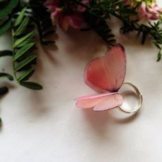 Welcome to my shop, where I create unique and handmade jewelry inspired by the beauty of nature. My Baby Pink Butterfly Ring is a stunning and feminine piece that is perfect for any nature lover or fashionista.The butterfly on this ring is delicately crafted from silk, with intricate details that capture the essence of a real butterfly's wings. The band of the ring is adjustable, making it comfortable to wear and suitable for any finger size.This ring is perfect for adding a touch of nature-insp Real Butterfly Wings, Feminine Jewelry, Romantic Rings, Butterfly Ring, Natural Silk, Pink Butterfly, Pinky Ring, Party Looks, Butterfly Wings