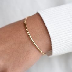 "14K Solid Gold Hammered Bar Bracelet.  14k solid gold hammered half round bar is about 48mm x 2.5mm. 14k gold 1.3mm cable chain 14k gold clasp ** How to choose a correct size of bracelet. 1. Measure your wrist below the wrist bone using a flexible tape measures, a string or a strip of paper. 2. If using a string or a strip of paper, mark length. Then, measure it with a ruler.  3. To find the bracelet size, add 1/2\" to 3/4\" for a comfort fit, add 1/4\" for a snug fit, add 1\" for a loose fit. Personalized Gold Bracelet, Initial Bracelet Gold, Gold Bar Bracelet, Initial Charm Bracelet, Gold Heart Bracelet, Puffy Heart Charms, Gold Bar Earrings, Rainbow Moonstone Necklace, Tape Measures