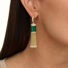 Rarities Malachite and Multigemstone Gold-Plated Tassel Earrings  Gorgeous green malachite, gold-plated chains and an Art Deco-inspired design make these luxe earrings a great choice for chic, stylish accessorizing. Finished with sparkling white zircons and moonstone bead accents, the delightful drops are sure to help you stand out from the crowd!       Approx. 2-5/16"L x 7/16"W     Stamped .925; 22-24K yellow gold plating     Pierced with clutch backs     Gold-plated earrings have half-hoops with chain link "tassel" drops      Half-hoops and tassel caps lined with round, white zircon accents     Tassel topped with green malachite cylinder     Chain lengths have white moonstone bead accents at base   Stone Information       All sizes and weights approximate     Green Malachite - Barrel (11 Elegant Gold Malachite Jewelry, Elegant Round Malachite Jewelry, Luxury Unique Malachite Jewelry, Luxury Elegant Malachite Earrings, Tassel Top, Malachite Earrings, White Moonstone, Color Bands, Moonstone Beads