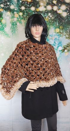 Hand crocheted poncho. Finished with faux fur. made with warm and soft alpaca wool with shades . enriched with a golden thread that makes this garment unique and fashionable. as you can see in the photos it can be worn both vertically and horizontally. Suitable for all women's sizes. The poncho is approximately 70 cm long and approximately 50 cm from the neck to the sleeve. For any information do not hesitate to ask. Brown Alpaca Poncho For Winter, Brown Alpaca Winter Cape, Handmade Winter Poncho Cape, Handmade Shawl Cape For Winter, Beige Alpaca Poncho For Winter, Winter Beige Alpaca Poncho, Handmade Yarn Poncho For Winter, Winter Crochet Yarn Poncho, Handmade Alpaca Poncho For Winter