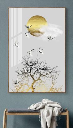 birds flying in the sky above a tree with yellow and white clouds, framed on a blue wall