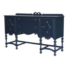 an antique style sideboard with two drawers and brass knobs on the doors, in dark blue