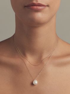 A pearl necklace perfect for layered look. Refined and minimal with a sliding drop shape freshwater pearl. Freshwater pearl 14kt gold 14 and 17 inch International orders : Duties, Taxes and VAT are not included in the total at checkout. Payment of any Duties, Taxes and VAT is the responsibility of the recipient. Chain Pearl Necklace, Pearl Leather, White Freshwater Pearl, Double Chain, Pearl Strands, Beauty Collection, Pearl Chain, Layered Look, Beauty Essentials