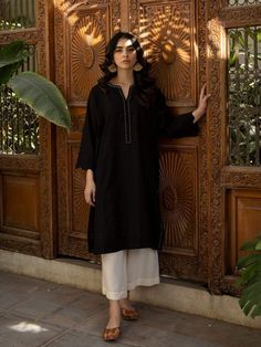 ✨This beautiful super stylish black cotton kurta  paired with Palazzo pant suit. For any kind of customization like Fabric/ Colour/ and size please message us  Care Instructions : Each product of ours is designed with highest quality standards and delicacy. Handle with care. Dry clean only. Unique Handcrafted Piece: Revel in the uniqueness of handmade fashion. Each set is a one-of-a-kind creation, showcasing the dedication and skill of our artisans. Own a piece that tells a story. Disclaimer: Co Fitted Cotton Lawn Suit For Work, Black Sets For Work Wear And Eid, Black Straight Kurta Set In Cambric, Black Cotton Straight Kurta, Black Kurta For Workwear And Eid, Black Cotton Lawn Suit For Work, Traditional Black Workwear Sets, Black Cotton Long Sleeve Kurta, Traditional Black Sets For Workwear