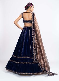 Editor's Note Navy Blue Without Sleeve Blouse Paired With Double Tier Lehenga And Tissue Dupatta Fabric: Velvet, Tissue Color: Blue Care: Dry Clean Only About the Designer Vvani by Vani Vats- a... Tissue Dupatta, Vani Vats, Blouse Yoke, Personal Shopping Service, Blouse Design Models, Blouse Design, Personal Shopping, Blouse Designs