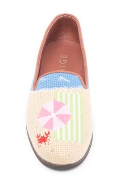 A hand-stitched, beach-inspired motif details this cushioned loafer lined in smooth leather. Slip-on style Textile upper/leather lining/textile sole Imported Casual Summer Beach Loafers, Beach Slip-on Loafers With Round Toe, Casual Leather Loafers For The Beach, Summer Beach Slip-on Loafers, Summer Beach Loafers With Textured Sole, Summer Beach Loafers With Closed Toe, Casual Loafers With Woven Sole For Beach, Beach Leather Loafers With Woven Sole, Beach Slip-on Closed Toe Loafers