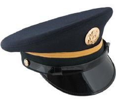 an officer's hat is shown on top of a visor with a gold emblem