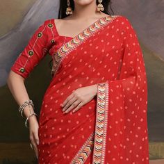 Red colored saree is made from georgette fabric which is highlighted with beautiful bandhej printed work as shown. Comes along with unstitched mono silk blouse piece which you can customise as per your design/style. Occasion - You can wear this saree for party, functions and fashionista. Note:- the actual product may differ slightly in color and design from the one illustrated in the images when compared with computer or mobile screen. Measurements: Saree : Georgette : 5.5 Mtrs Blouse : Georgett Saree For Party, Saree Georgette, Mobile Screen, Georgette Saree, Georgette Fabric, Georgette Sarees, Blouse Piece, Design Style, Silk Blouse