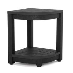 the side table is made out of black wood and has a circular design on it