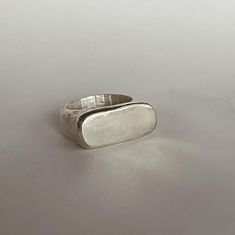 Your Plateau Ring is made by me in Sterling Silver! All my pieces are fully designed, hand carved/shaped the wax model, cast and polished by me.  Considering everything is made to order and by hand please allow for 3-4 weeks lead time for me to finish your piece.  Please make sure you specify your ring size and feel free to message me if you have any questions. Chunky Pinky Ring, Modern Handmade Signet Ring For Promise, Modern Handmade Signet Promise Ring, Handmade Rectangular Minimalist Rings, Handmade Minimalist Rectangular Rings, Handmade Modern Open Signet Ring, Handmade Modern Signet Ring As Gift, Modern Handmade Signet Ring As Gift, Modern Handmade Signet Ring For Gift