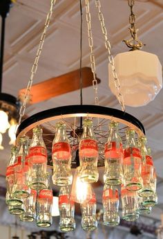 a chandelier made out of empty wine bottles