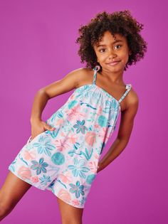 New this season! Our in-house artists created this vibrant ocean print for this easy-to-wear romper. Adjustable shoulder ties and on-seam pockets will make this a warm weather wardrobe favorite. 100% soft and lightweight cotton jersey. Thigh length. Matching family styles are available in our Sibling Shop. Summer Cotton Printed Bubble Romper, Summer Printed Bubble Romper For Playtime, Playful Cotton Beach Jumpsuits And Rompers, Casual Bubble Romper For Spring Vacation, Playful Cotton Jumpsuits And Rompers For Beach, Summer Cotton Bubble Romper With Floral Print, Blue Summer Bubble Romper For The Beach, Summer Floral Print Cotton Bubble Romper, Playful Bubble Romper For Spring Vacation