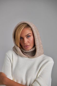 Gray hooded scarf Women snood Knitted hooded scarf The multifunctional winter accessory is made of semi-woolen yarn. The model consists of an elastic collar that covers the neck well and a spacious hood in a textured weave. The elegant accessory has a wide lapel for extra warmth. Leave this snood on after you take off your jacket, it will become a stylish addition to a pullover or sweater. A super soft and cozy hooded scarf. Product details: 70% acrylic, 20 % mohair, 10 %wool Width - 14 in Lengt One Size Hooded Balaclava For Fall, Hand Knitted Scarves For Winter, One Size Fall Balaclava With Hood, Winter Beige Knit Bonnet, Hand Knitted Hooded Balaclava For Cold Weather, Hooded Hand Knitted Balaclava For Cold Weather, Winter Wool Knit Scarves, Knit Winter Scarves, Winter Knitted Infinity Scarf For Cold Weather