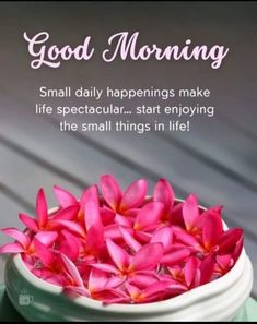 pink flowers in a white bowl on a green plate with the words, good morning small daily