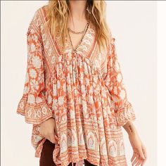 Brand New Just Bought This Last Month! Took The Tags Off But Never Wore It Orange Long Sleeve Boho Dress For Beach, Summer Long Sleeve Orange Boho Dress, Bohemian Apricot V-neck Dress, Orange Long Sleeve Boho Dress For Summer, Apricot Bohemian V-neck Dress, Flowy Orange Boho Dress With Long Sleeves, Orange Flowy Long Sleeve Boho Dress, Flowy Orange Boho Dress, Flowy Long Sleeve Orange Boho Dress