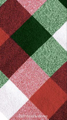 a red, green and white checkered pattern on fabric