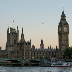 the big ben clock tower towering over the city of london