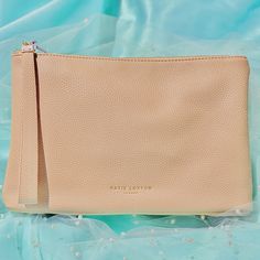 For those warm summer days when you're looking to take a slower place, our stylish Isla Clutch in pale pink is the perfect companion to stash away your essentials in the most casual yet luxe way possible. Featurng an internal slit pocket and wristlet attachment, head outdoors for a slow-paced day… and relax! Bride Gifts, Clutch Wallet, Pale Pink, Summer Days, Take That, Perfect Gift, Wallet, Pink, Gifts