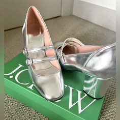 Nwt Silver J Crew Mary Jane Shoe. 3” Block Heel. Size 9m But Fit Is Big. Would Fit 9.5 Or 10. Silver Mary Jane Heels For Party, Spring Silver Mary Jane Heels, Silver Round Toe Mary Janes, Silver Court Shoes With 4-inch Heel, Metallic Silver Heels With 4-inch Heel Round Toe, Silver Shoes, Mary Jane Shoes, Mary Janes, J Crew