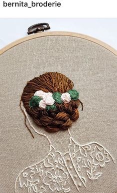 an embroidery project is being displayed on a white board with the words,'bernita - broderie '