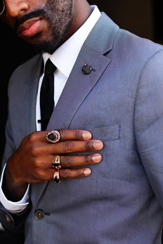 A masculine silk lapel button pin boutonniere for men! I used a black, white, and gray silk  with a tiny bit of pink, to make this 3/4 inch covered button, and mounted it onto a tie tack finding with a butterfly clutch back. Because of the complex pattern, each button looks a little different! Adds elegance to a suit, sport jacket or blazer. Use coupon code BUY2PINS for $5 when you buy any two pins. Use coupon code BUY3PINS for $10 off when you buy any three pins! I'm adding a free silk button lapel pin to your order when you spend $75 or more! Here's another one of my silk lapel buttons https://www.etsy.com/listing/204577120/mens-lapel-pin-button-lapel-pin-custom?ref=listing-shop-header-2 More accessories for men and women in my whole shop here http://exquisitelapel.etsy.com Classic Black Lapel Pin For Formal Occasions, Elegant Black Business Lapel Pin, Elegant Black Lapel Pin For Formal Occasions, Suit Pin, Lapel Pins Mens, Butterfly Clutch, Groomsmen Suits, Sport Jacket, Pin Button