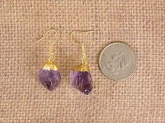 Amethyst crystal point earrings with 24k gold electroplated cap gold plated earwires S12B6-01 Beautiful Natural Amethyst crystals STOCK PHOTOS. Gemstones measure approximately 18mm x 12mm -- each pair will vary slightly because these are natural stones. Earrings measure approx. 40mm in their entirety. Comes in a gift box Stones Earrings, Gemstone Earrings Gold, Amethyst Crystals, Crystal Points, Amethyst Crystal, Jewelry Plate, Earrings Gold, Gemstone Earrings, Natural Stones