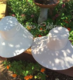 "A beautiful and classic wide brim hat in natural color .... Classic and Elegant. A touch of elegance with this big linen sunhat. Chic and unique in it's look and perfectly suited for all events ~ beach-goer, walking, shopping, gardening, weddings . . . Brim is made perfectly wide enough to protect your face and neck from sun exposure and can be folded up at the front, side, or back for a versatile look - and the shape will hold. Great hat for vacation or travels as it packs well without losing Classic Wide Brim Boater Hat For Garden Party, Classic Flat Brim Panama Hat For Garden Party, Elegant Bucket Hat For Garden Party, White Adjustable Panama Hat For Garden Party, Classic Wide Brim Boater Hat For Wedding, Classic White Bucket Hat With Short Brim, Classic White Bucket Hat For Summer, White Classic Bucket Hat For Summer, Classic White Summer Bucket Hat