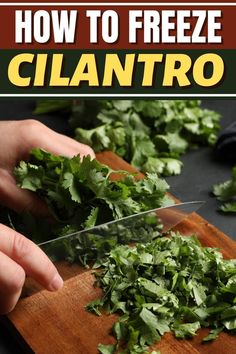 a person cutting up cilantro on top of a wooden cutting board with the title how to freeze cilantro