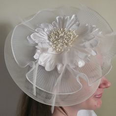 Nwot White Fascinator With Netting, Feathers, And White Flower. Measures 9.5" W. White Fascinator With Handmade Flowers, White Fascinator Headband With Handmade Flowers, White Feathered Fascinator Hat, White Whimsical Headband Fascinator, Black Carhartt Beanie, Luxury White Feather Fascinator, Harry Potter Platform, Leather Top Hat, White Fascinator