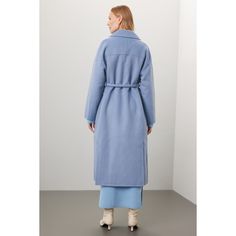 Blue heavy needle knit (50% Wool, 50% Polyester). Coat. Long sleeves. Collar. Tie closure. 53.5" from shoulder to hemline. Imported. Chic Blue Outerwear For Daywear, Blue Winter Outerwear For Daywear, Oversized Blue Outerwear With Solid Color, Oversized Wool Outerwear In Solid Color, Blue Oversized Sweater Coat, Oversized Light Blue Long Sleeve Outerwear, Oversized Blue Solid Color Outerwear, Oversized Blue Solid Outerwear, Oversized Long Blue Outerwear