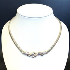 "Fine Silver Flat Snake Chain Necklace with Center Detail- Vintage .999 Silver ~Made in USA - 18.5\" - ET1385 Metal Content: .999 Silver (Fine Silver) Clasp: Lobster Measurements Length:  18.5\"  Width of Chain:  1/4\" (6mm) Weight: 41.31 Grams - this is a heavy chain Marked: .999 USA Condition: Excellent  Each piece is thoroughly examined and refinished as needed by our professional jewelers, tested to guarantee metal content,  graded by our in-house GIA (Gemological Institute of America) Graduate Gemologist, and inspected for quality before being carefully packaged and promptly shipped. Thank you for taking the time to shop with us! We have hundreds of more listings, with more being added every week! From necklaces to bracelets, the classics and trendy.  We are likely to have something y Elegant Hallmarked White Gold Chain Necklace, Elegant Sterling Silver Hallmarked Chain Necklace, Classic White Gold Metal Necklaces, Classic White Gold Metal Necklace, Elegant Sterling Silver Chain Necklace With Polished Finish, Classic Metal Necklace With Polished Finish, Classic Metal Necklace With Snake Chain, Classic Sterling Silver Chain Necklace For Anniversary, Classic White Gold Snake Chain Jewelry