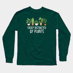 The "Easily Distracted By Plants" t-shirt is a playful and fun piece of clothing that highlights the love and obsession with plants. The shirt features the phrase "Easily Distracted By Plants" in bold letters on the front, accompanied by images of potted plants. It's a great way to express your passion for indoor or outdoor plants and how they can easily distract you from anything else. This shirt is perfect for anyone with a green thumb and a love for nature. -- Choose from our vast selection … Long Sleeve T-shirt With Plants Print For Spring, Love And Obsession, Spring Botanical T-shirt With Plant Print, Powered By Plants Shirt, Easily Distracted By Plants Shirt, Short Sleeve T-shirt With Plants Print For Gardening, Bold Letters, Easily Distracted, Plant Design