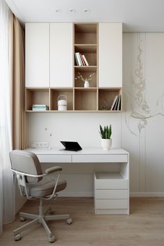 a white desk and chair in a room