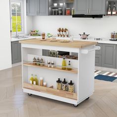 a kitchen island with lots of food on it