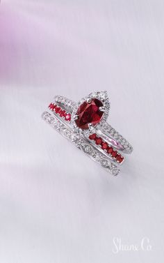 We're loving the look of a colored center stone for an engagement ring, especially when it's a romantic and radiant ruby! This whole look is the perfect mix of diamonds and rubies. Article numbers: 41086721, 41049864, 41077581 Peach Sapphire, Blue Green Sapphires, Jewelry Cleaning Solution, Platinum Jewelry, Black Sapphire, Make Your Own Jewelry, Dream Engagement, Orange Sapphire, Filigree Design