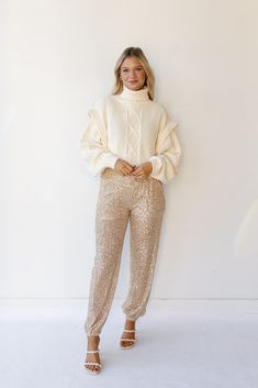 last minute plans sequine pants these are the perfect holiday party pants! lined with shorts, elastic waistband, jogger fit Miranda is wearing a size small runs true to size hand wash recommended